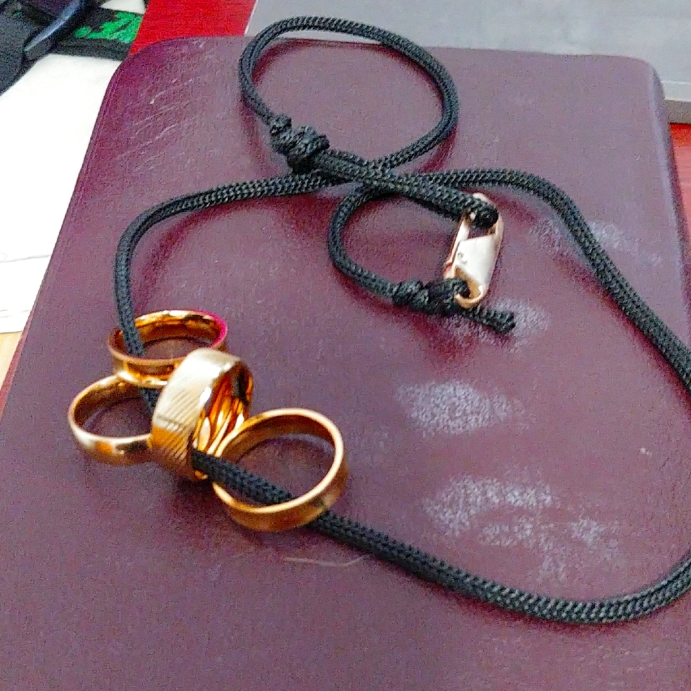 Gold Rings on Black Cord Necklace - Picture 1 of 4